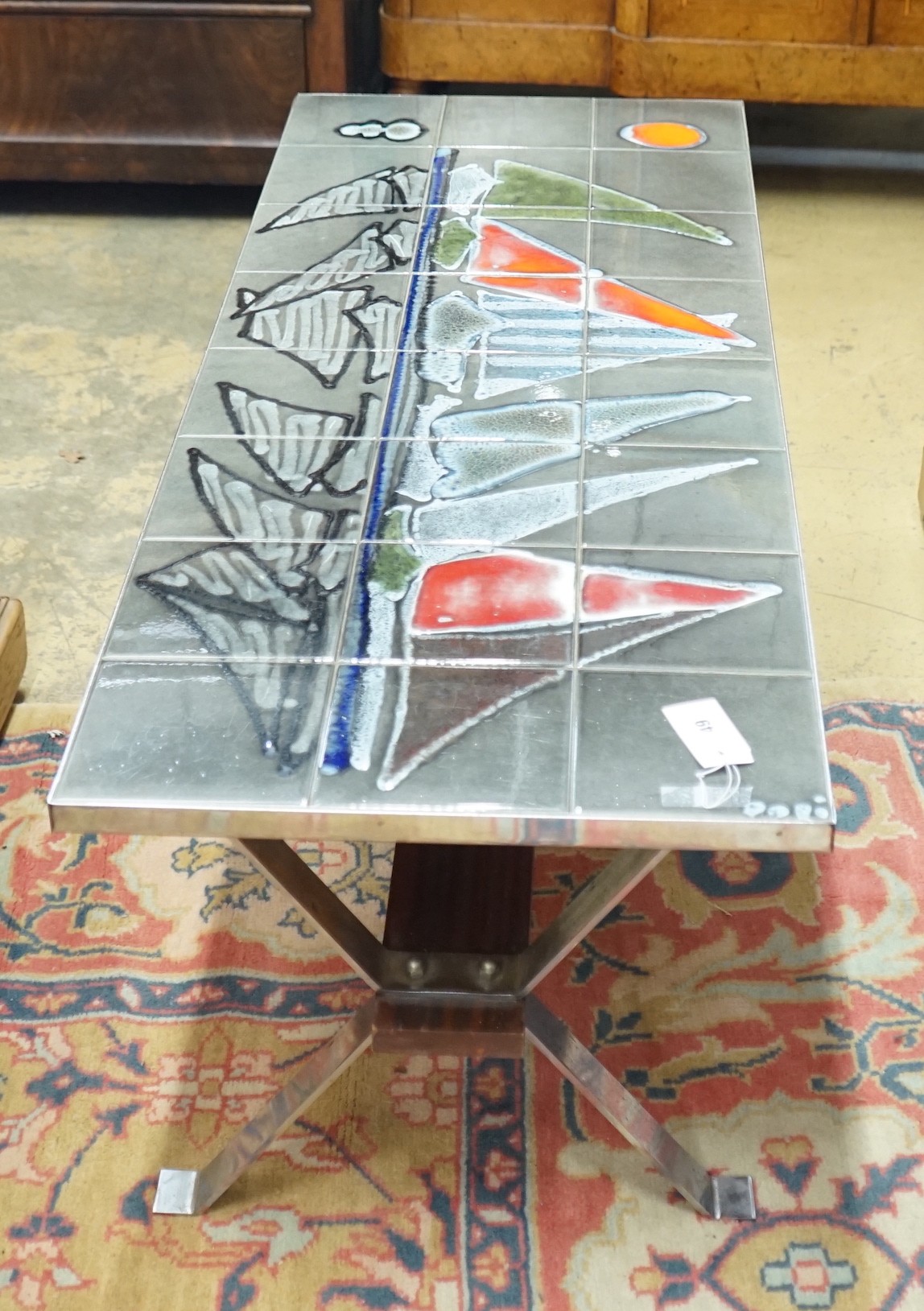 A 1960's Adri Belgique tiled topped rectangular chrome coffee table with wood stretcher, width 124cm, depth 47cm, height 42cm